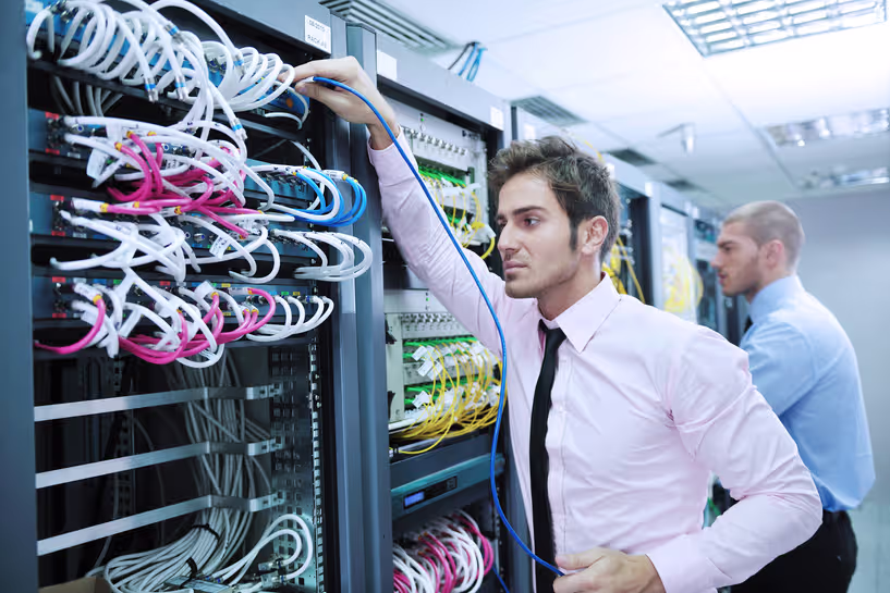 Network consultant reviewing business infrastructure with a client