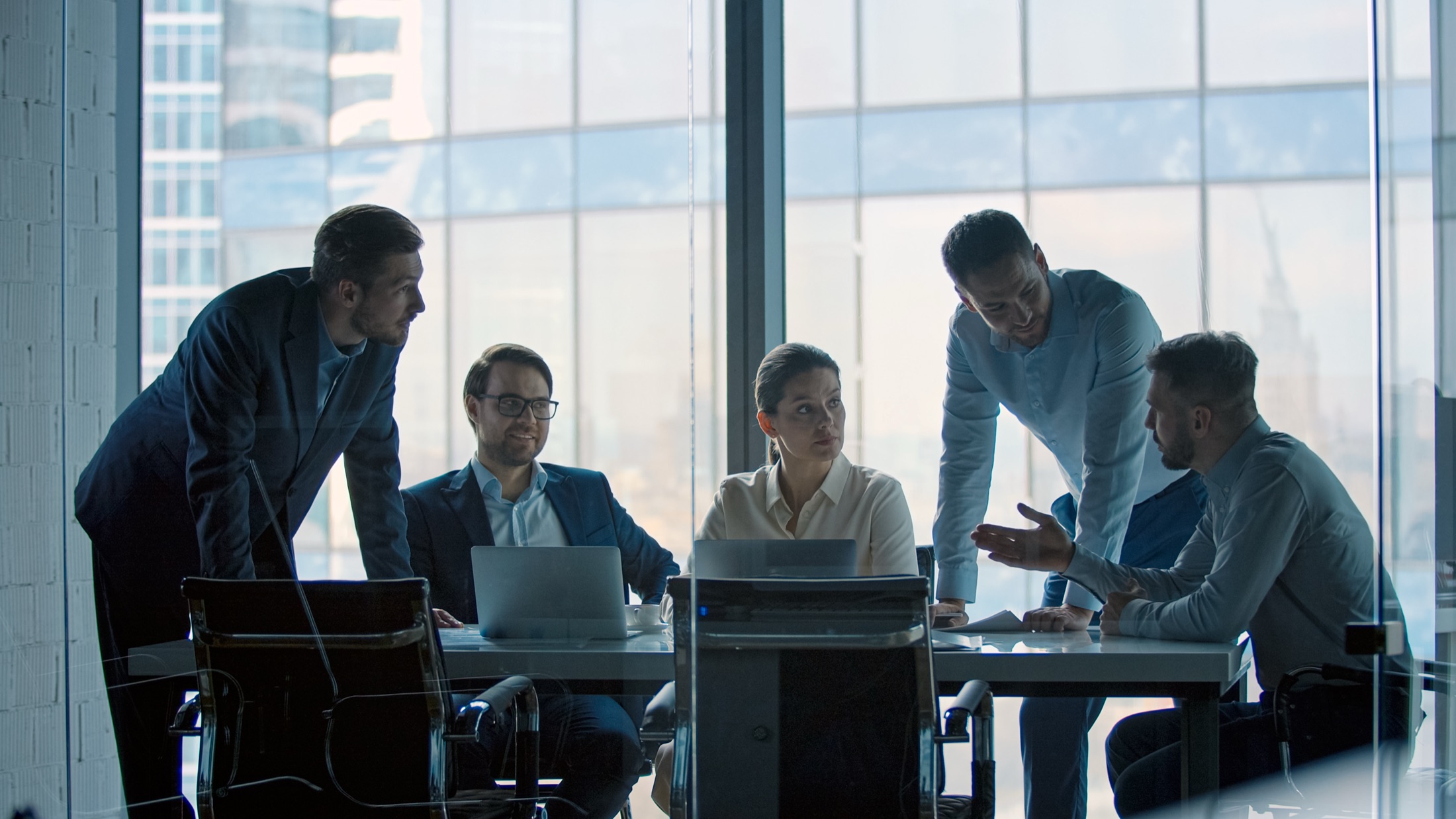 Consultants evaluating business impact priorities